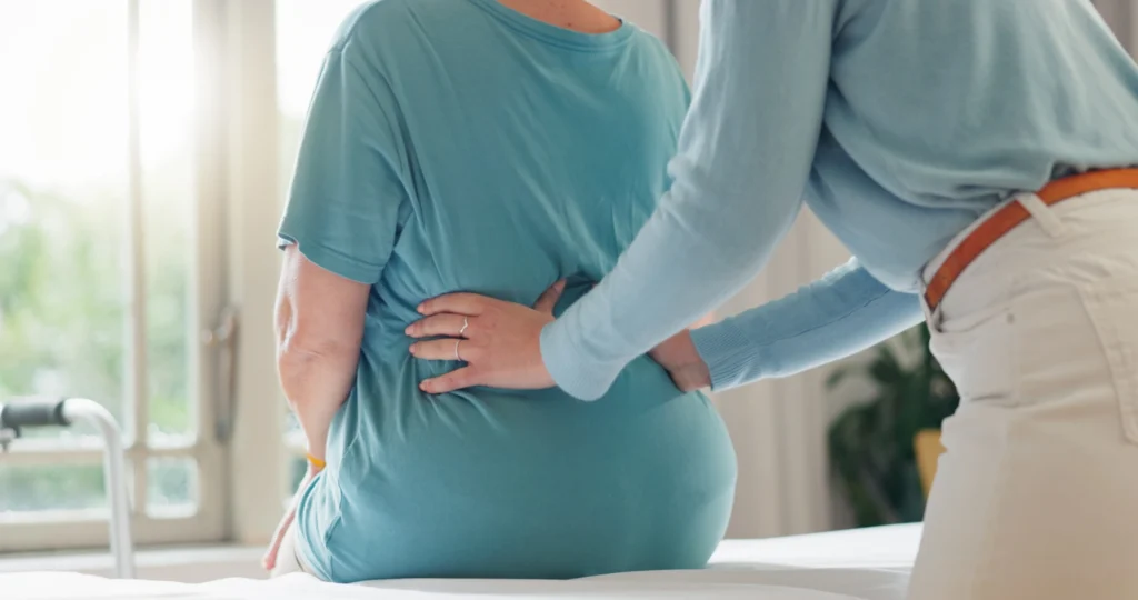 back pain physiotherapy and hands of people in of 2024 09 20 16 01 30 utc
